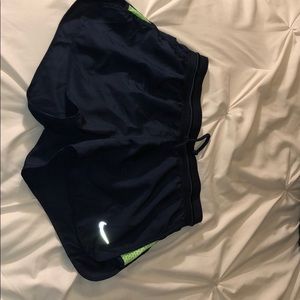 Navy and green bike shorts